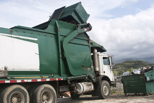 Construction site with builders removing waste